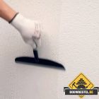 Hoe kan ik een muur glad maken (egaliseren)?