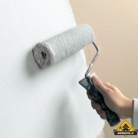 Hoe schilder ik mijn gestucte muur?