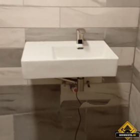 Hoe plaats ik een wastafel?